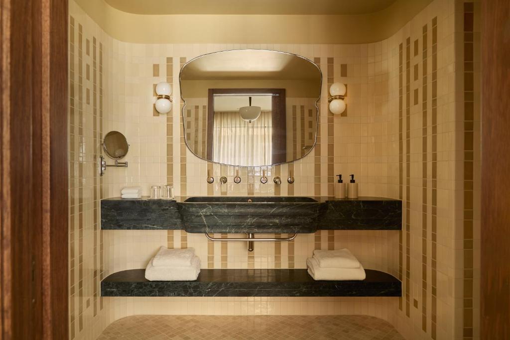 chic bathroom with a large marble sink 